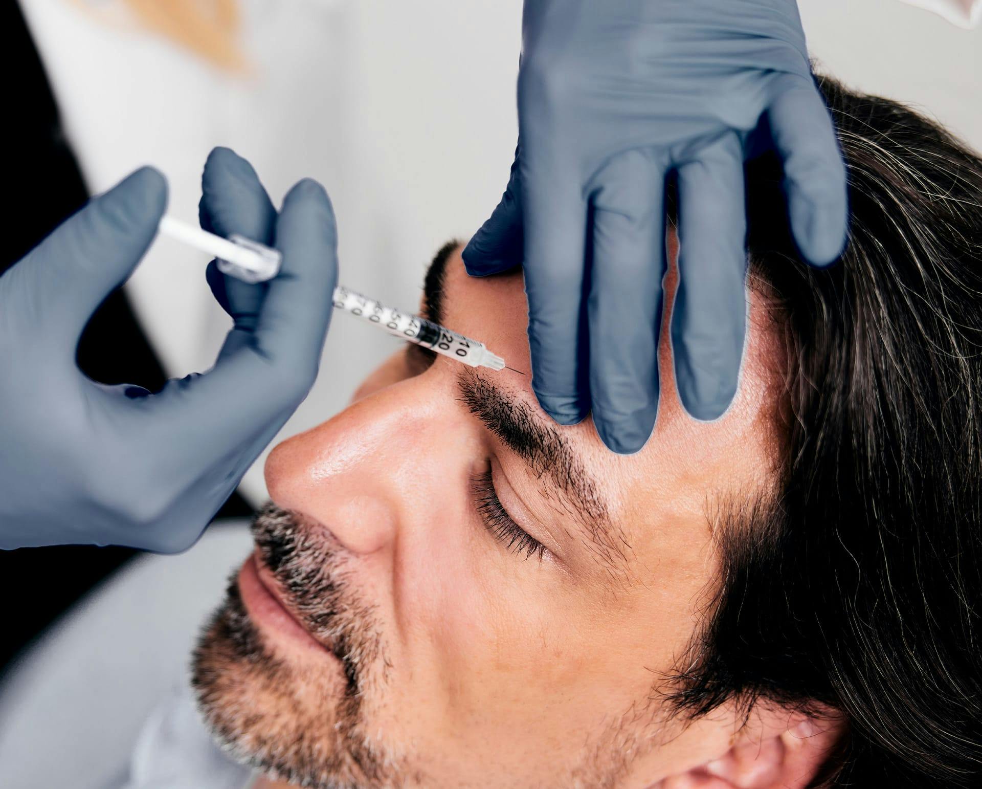 Man receiving injectable treatment