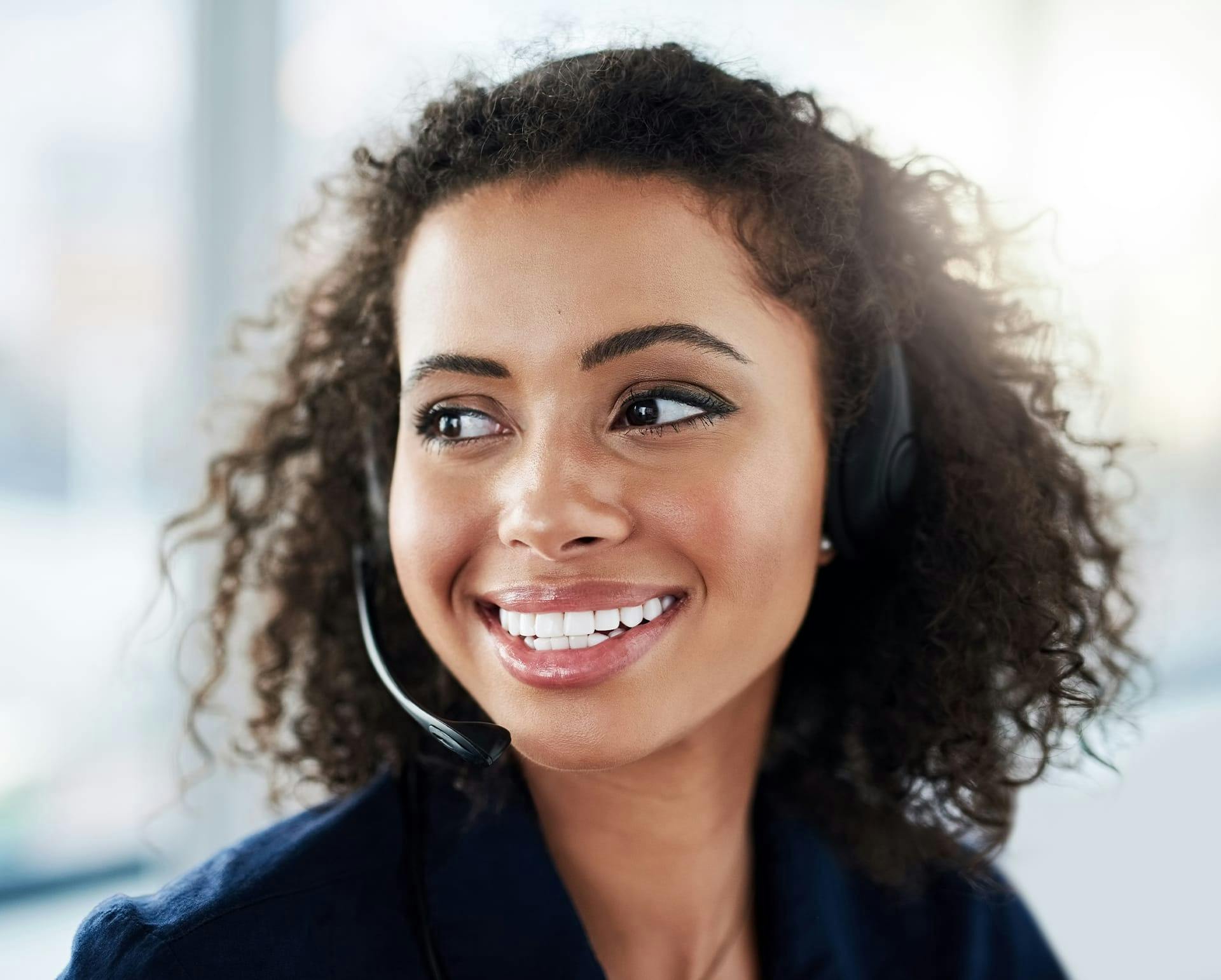 Woman looking to the side smiling