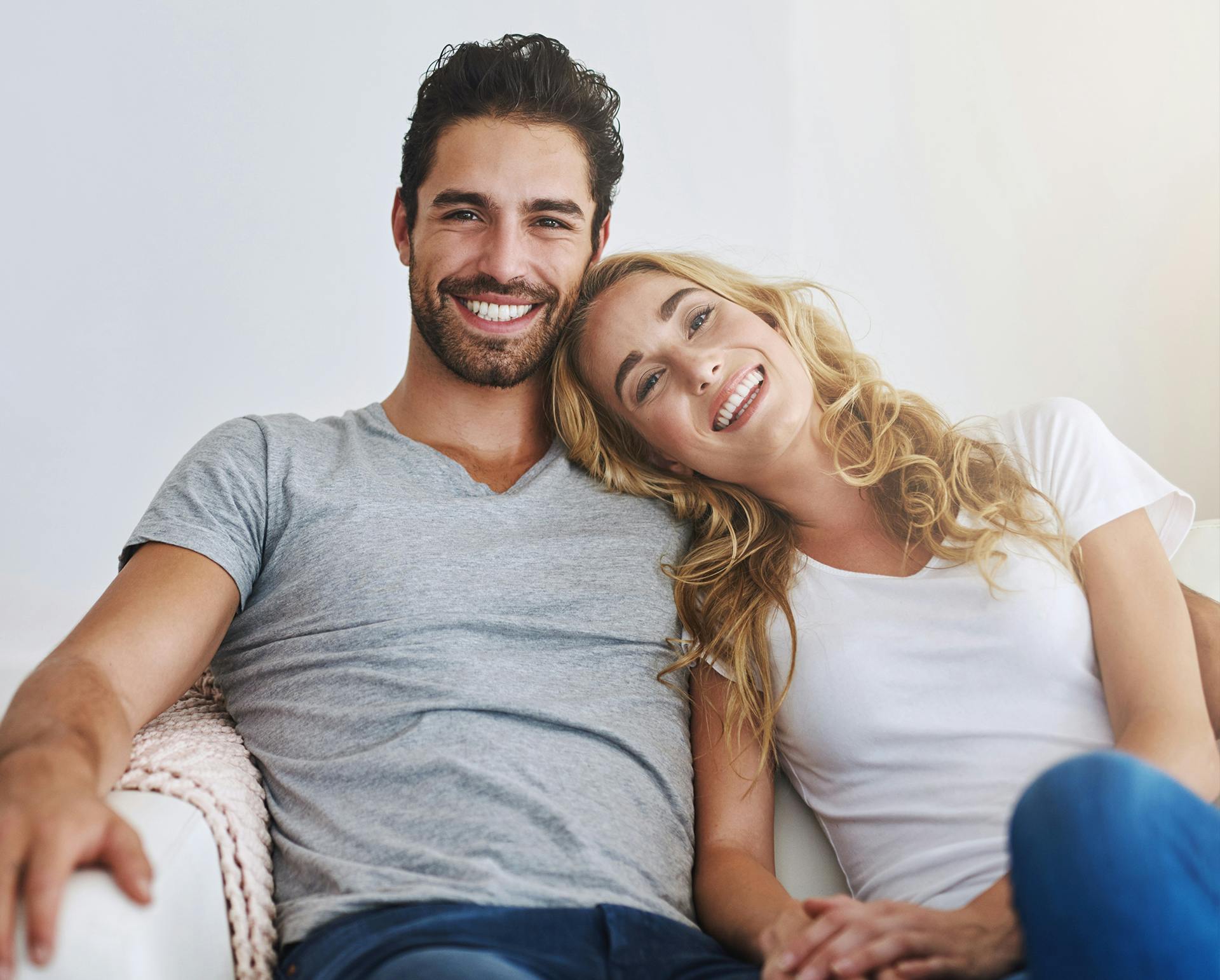 Couple sitting on couch