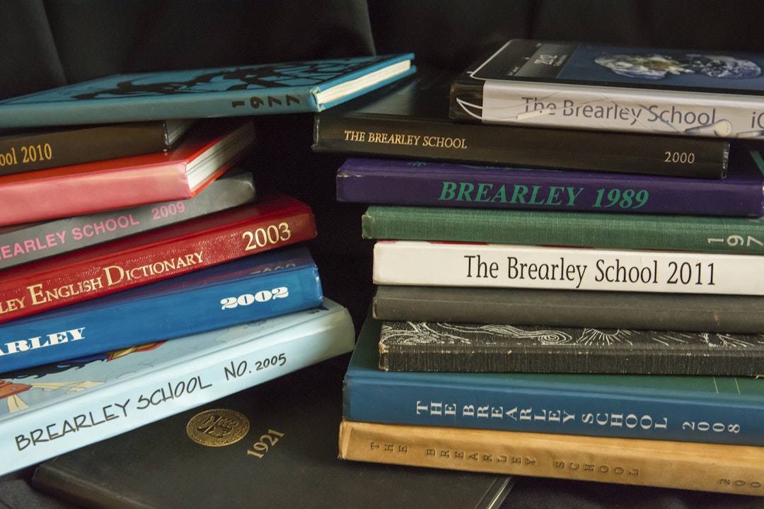 Piles of yearbooks, all put together by the Yearbook Club.