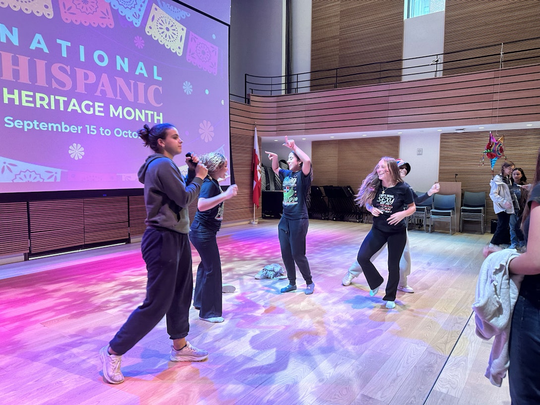 Upper School students dancing as part of the Hispanic Heritage Month celebration hosted by Luna, the Upper School Hispanic/Latinx affinity group
