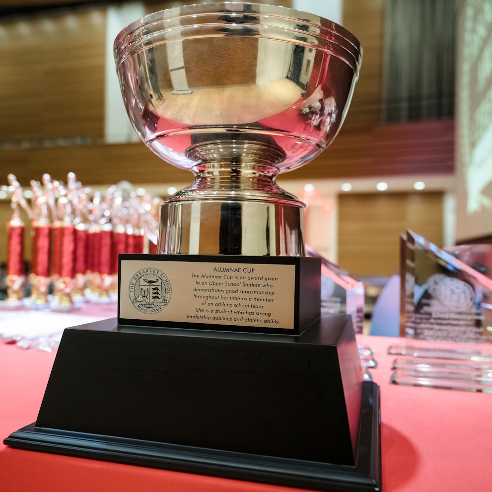 A close up of the Alumnae Cup which is a large silver bowl mounted on a stand