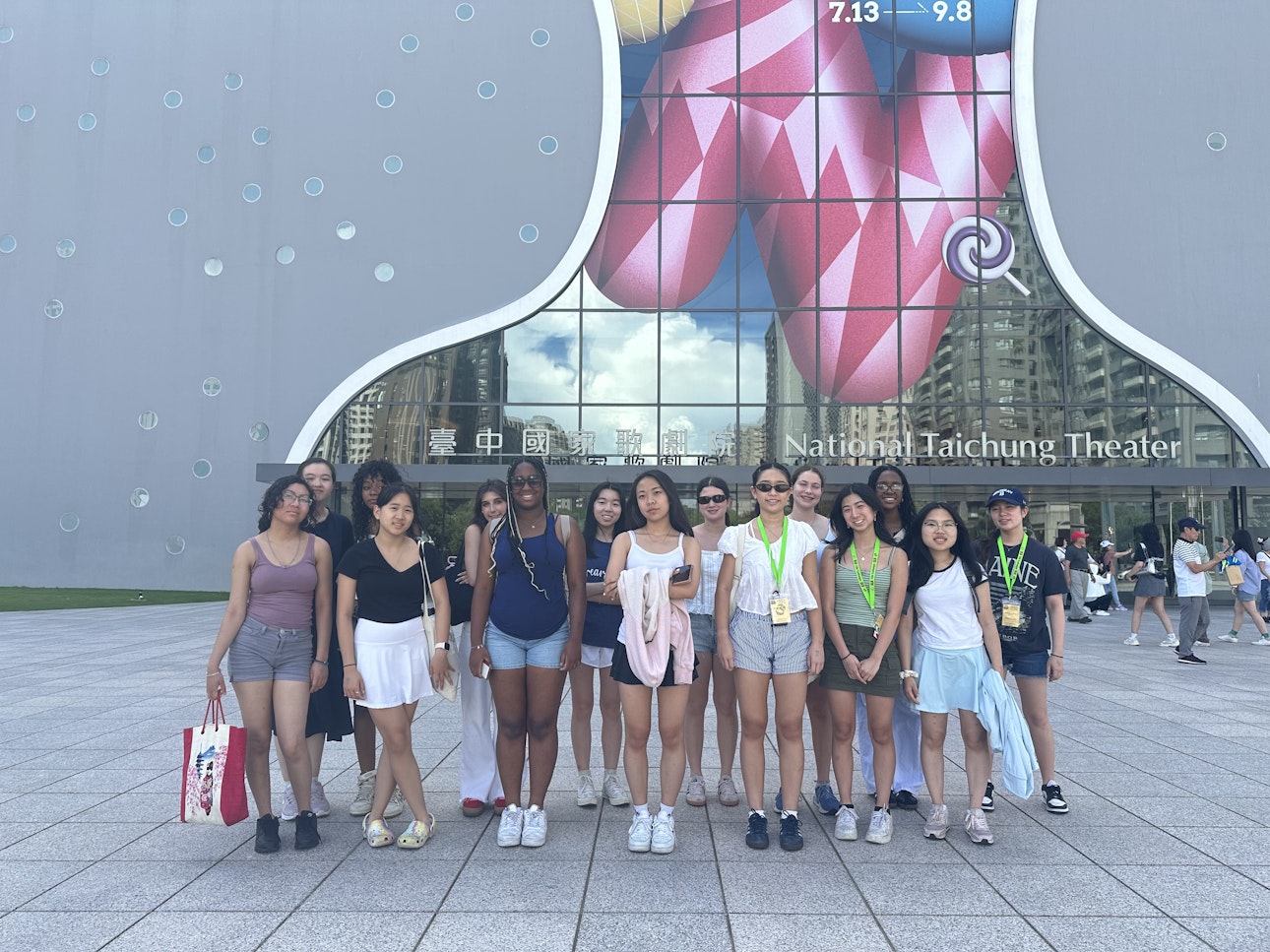 Students on their trip to Taiwan posing as a group in front of the National Taichung Theater
