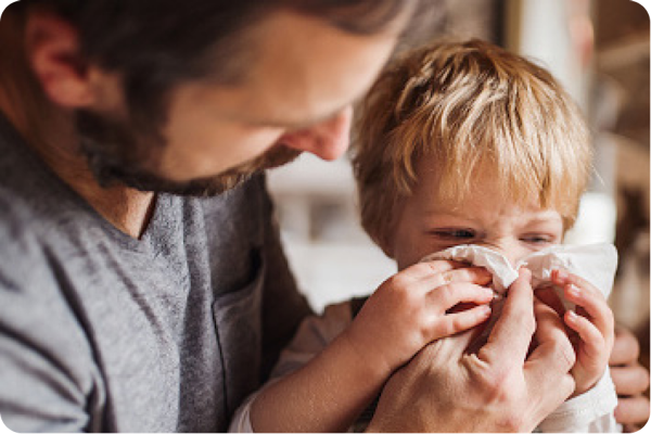 father taking care of child