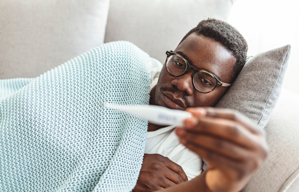 man at home sick