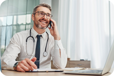 male doctor on phone