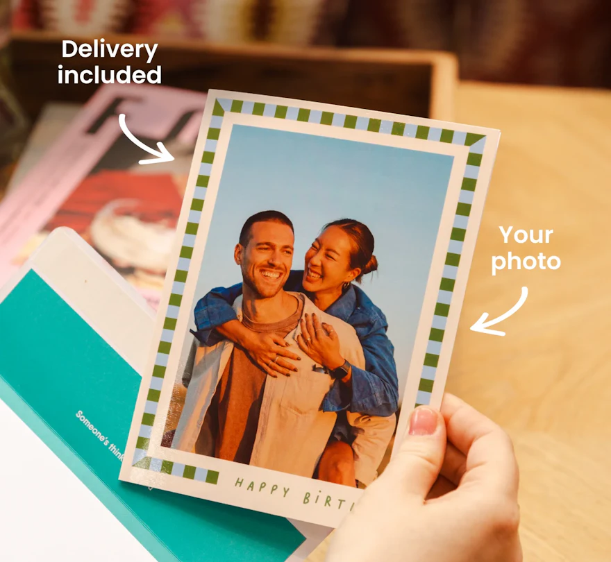 Personalised TouchNote birthday card held over a teal envelope
