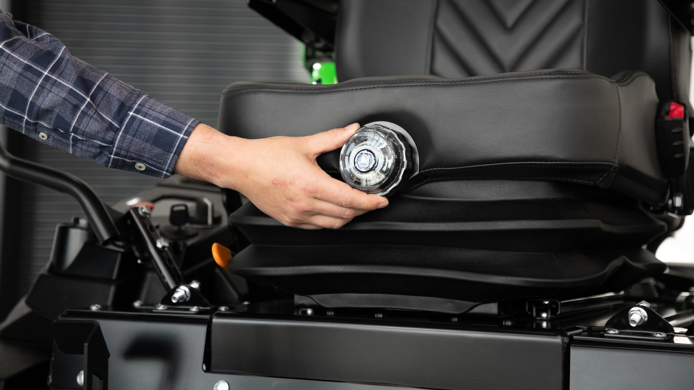 Comfortable commercial zero-turn mower suspension seat and platform