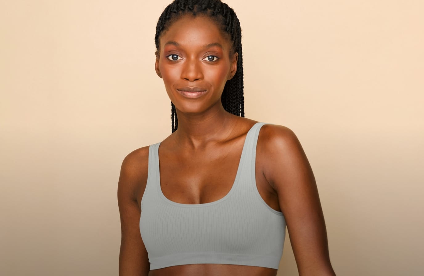 Beautiful smiling woman looking straight ahead