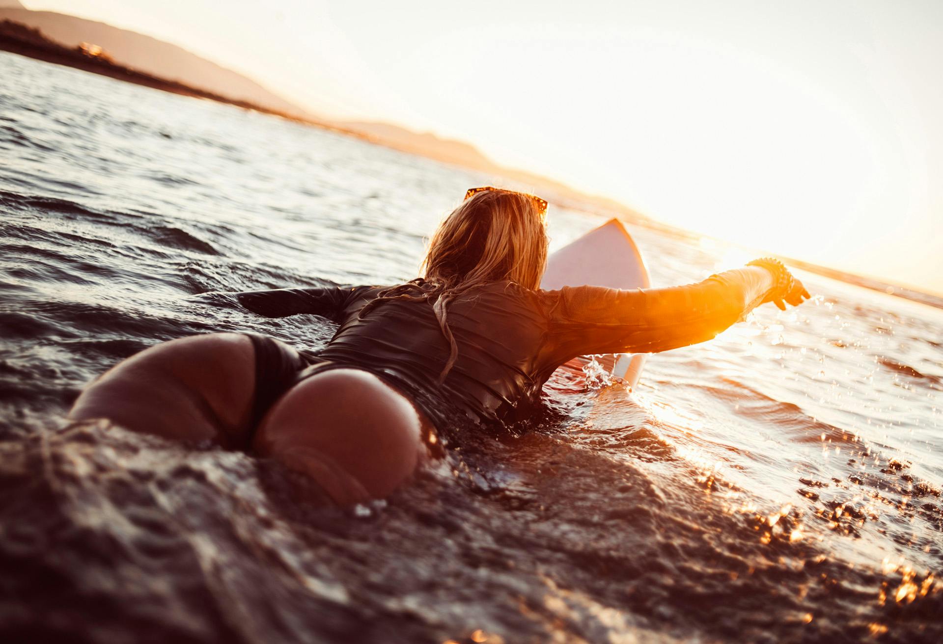 Woman on a surfboard in the ocean