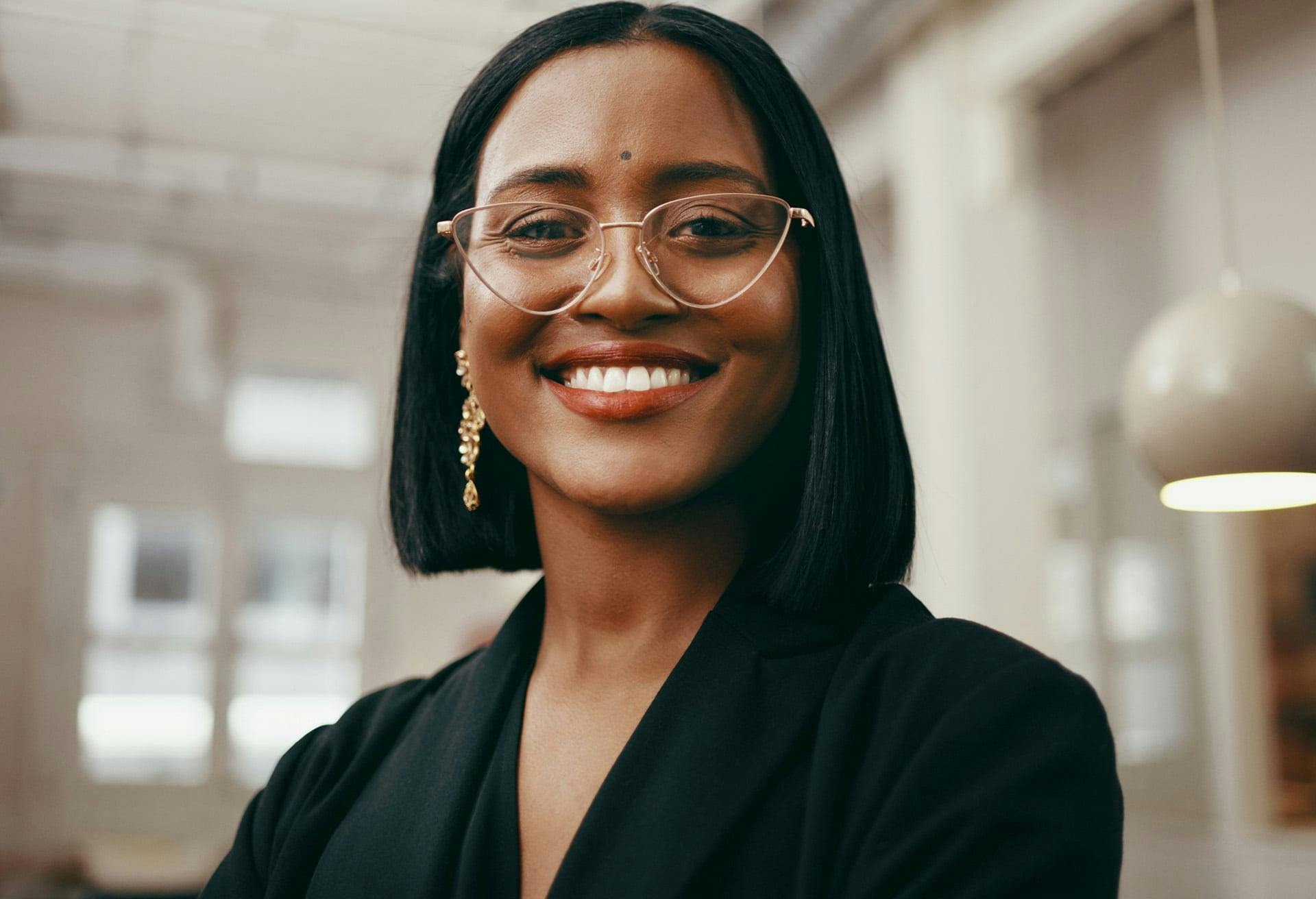 Woman with short hair wearing glasses