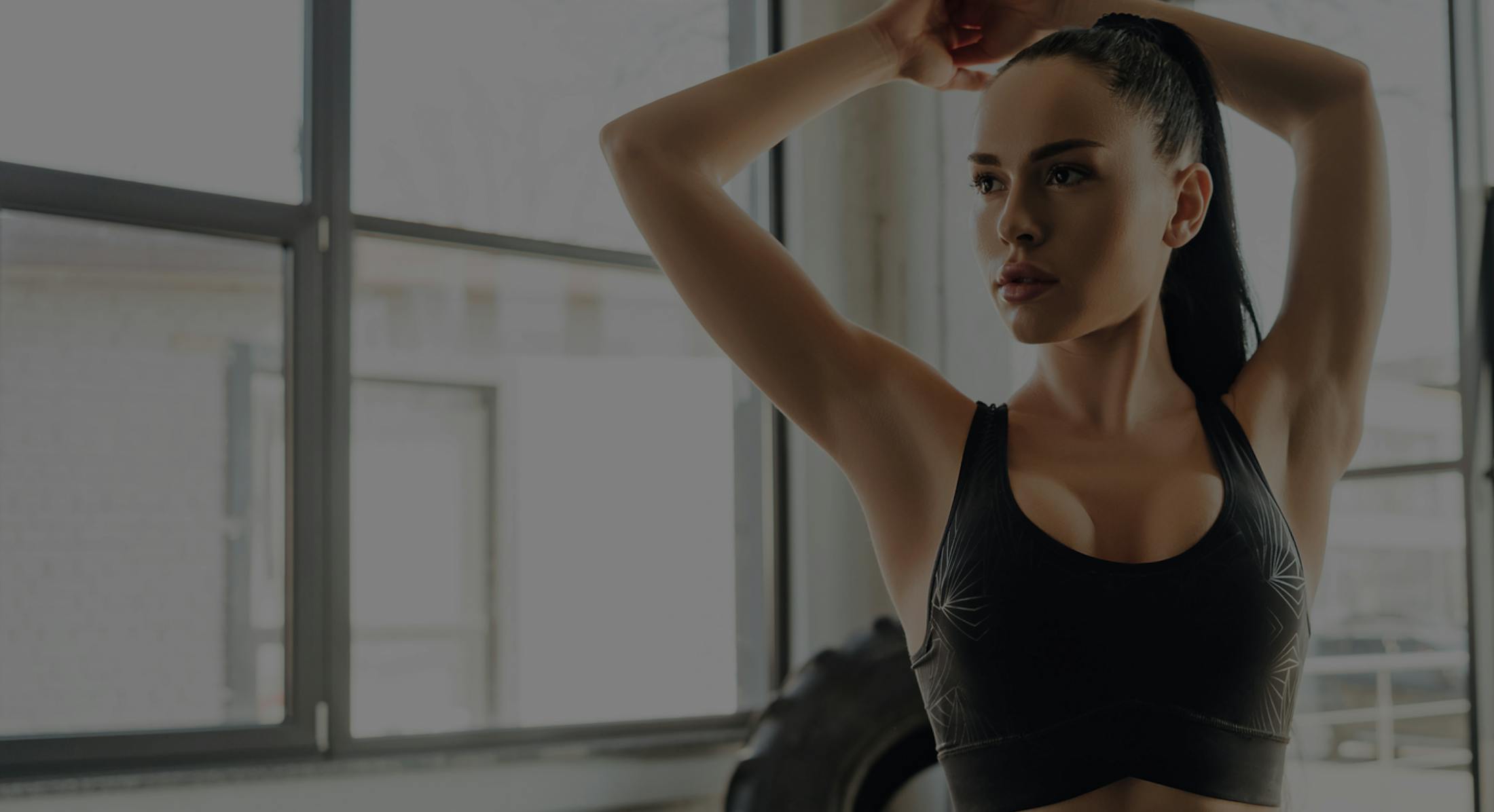 Fit woman stretching