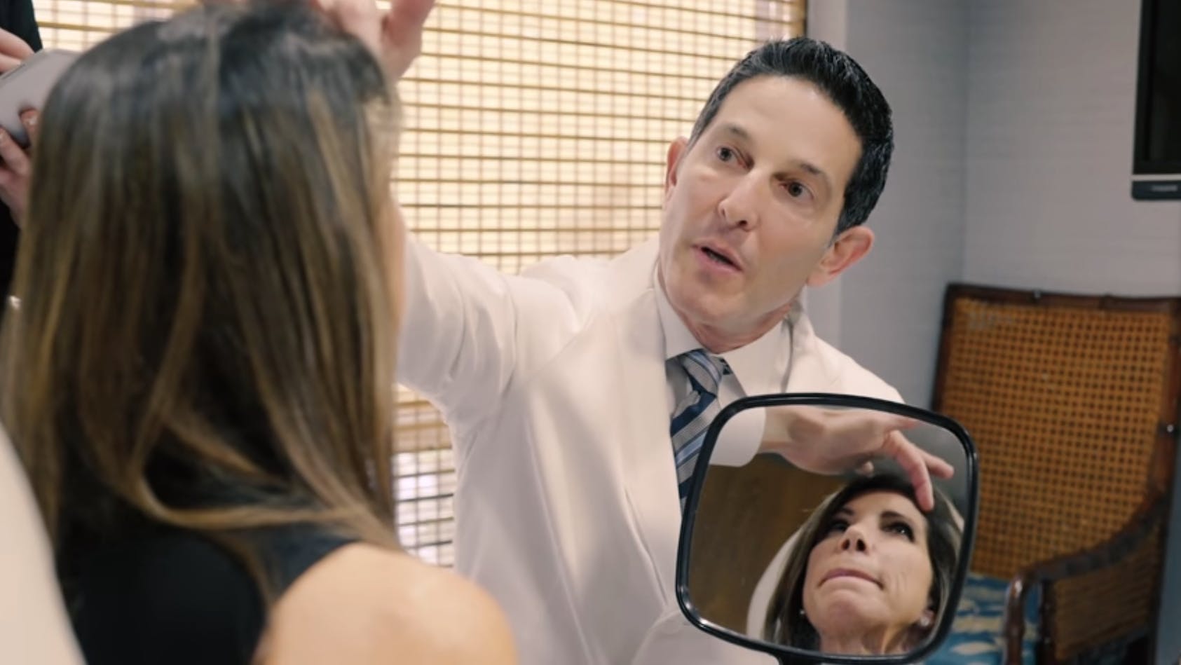 Dr. Schwartz examining patient