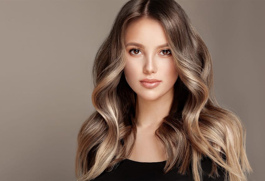 Beautiful woman smiling and looking ahead