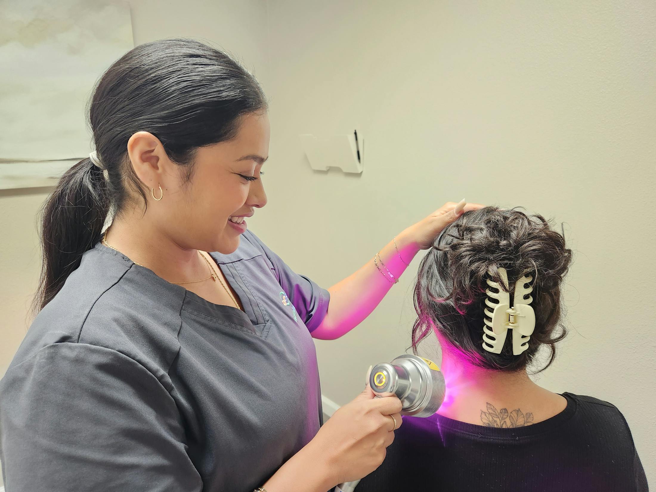 Woman getting laser therapy