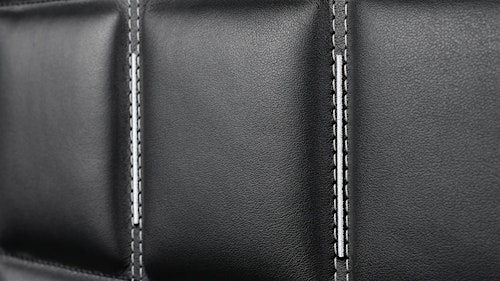 Close-up of the quilted leather interior with detailed stitching in the BUBEN&ZORWEG ORION high-security safe. — BUBEN&ZORWEG