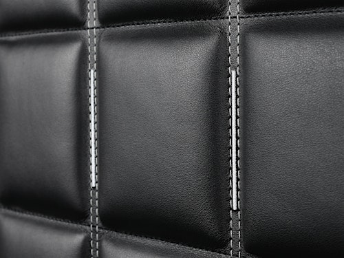Close-up of the quilted leather interior with detailed stitching in the BUBEN&ZORWEG ORION high-security safe. — BUBEN&ZORWEG