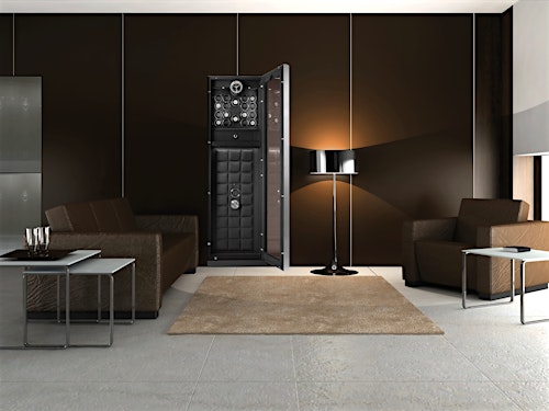 BUBEN&ZORWEG VISION high-security safe integrated into a modern living room, showcasing its open door with illuminated interior and multiple watch winders. — BUBEN&ZORWEG