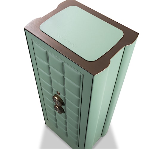 Top-down view of the BUBEN&ZORWEG ORION high-security safe in a mint green finish, featuring a quilted inner door panel and gold advanced locking mechanism. The unique design combines luxurious aesthetics with robust security features. — BUBEN&ZORWEG