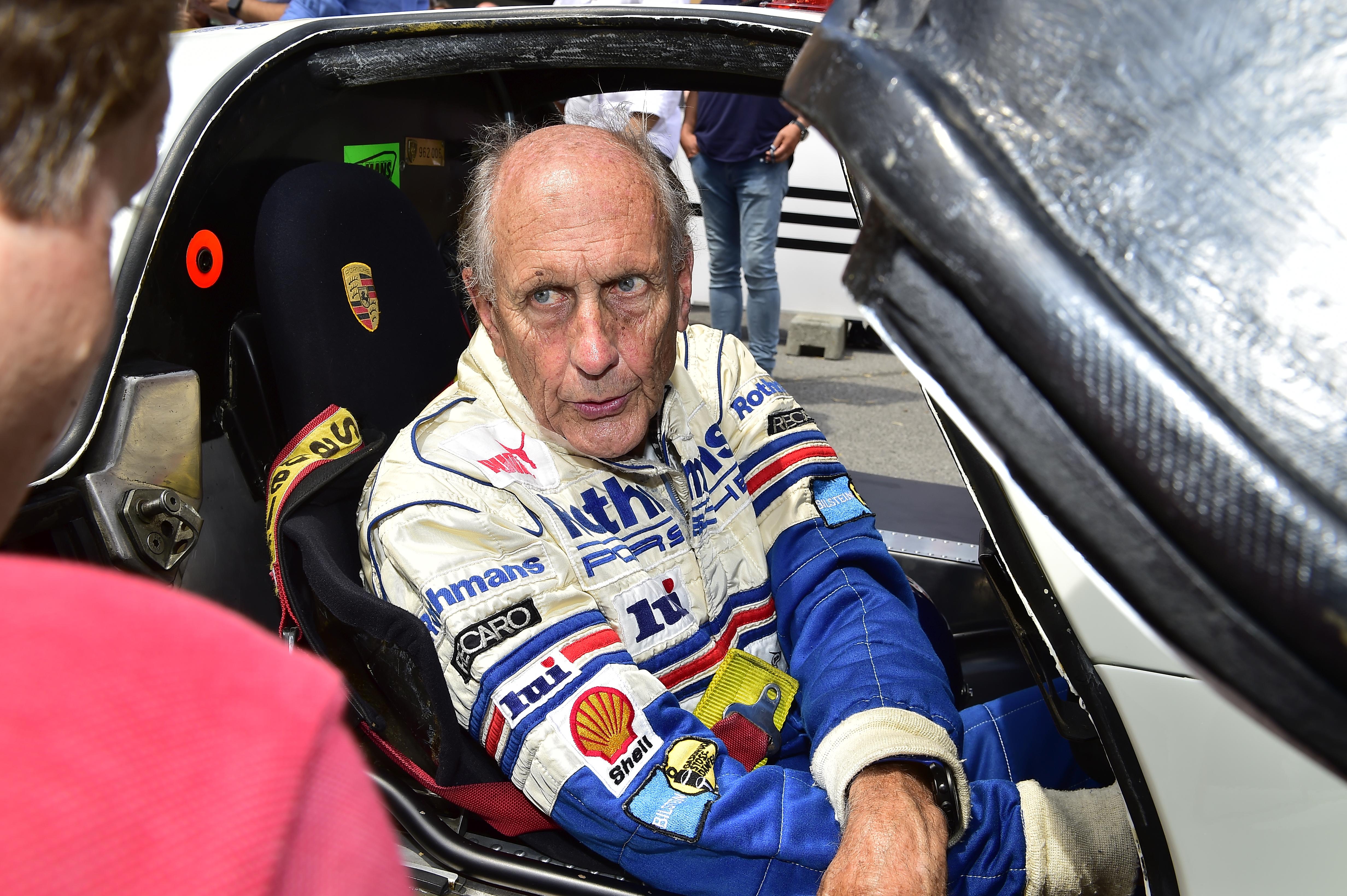 Race car driver sitting in a vintage Porsche at Ennstal-Classic — BUBEN&ZORWEG