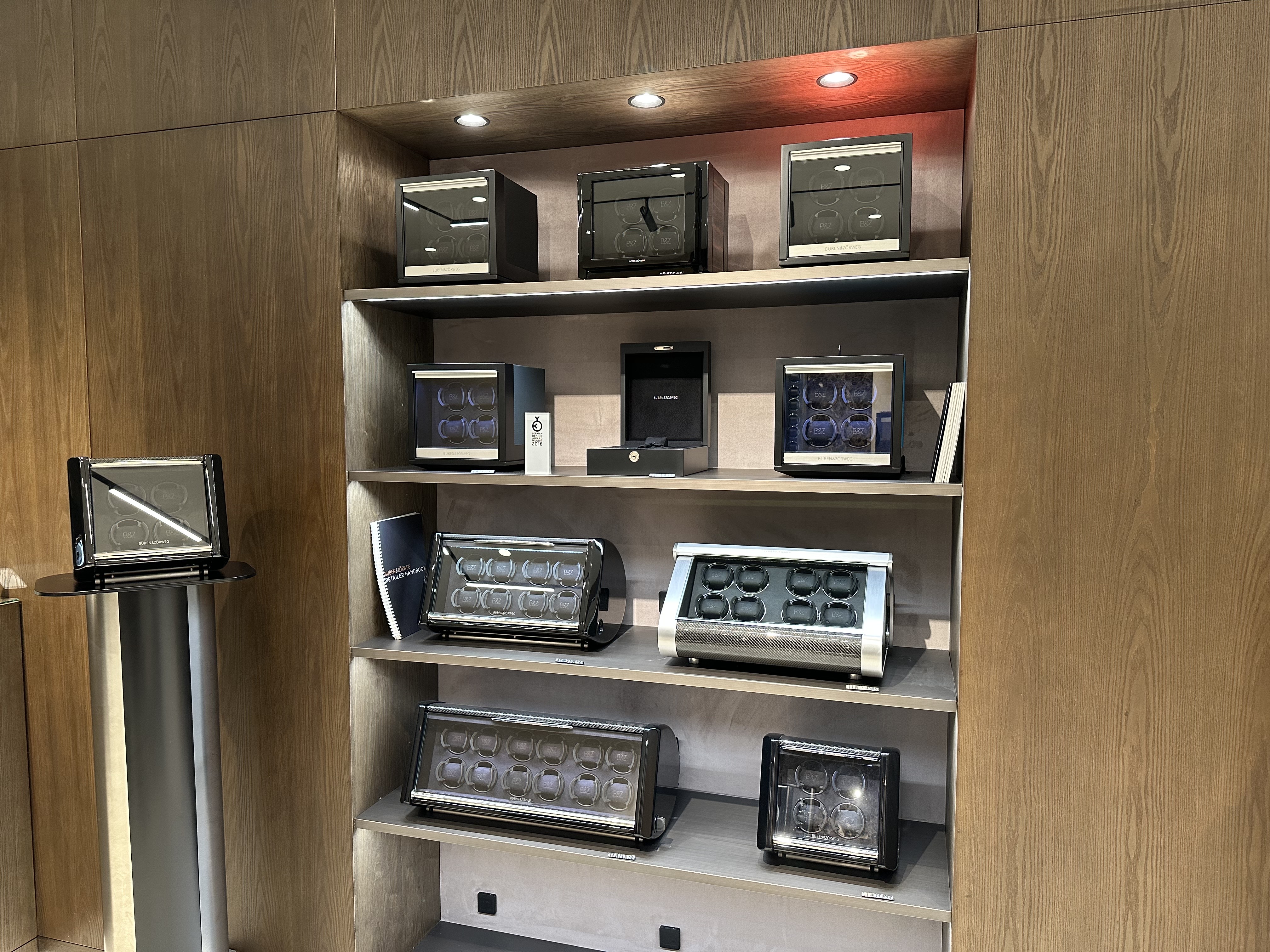 Watch winders displayed on shelves in boutique setting — BUBEN&ZORWEG
