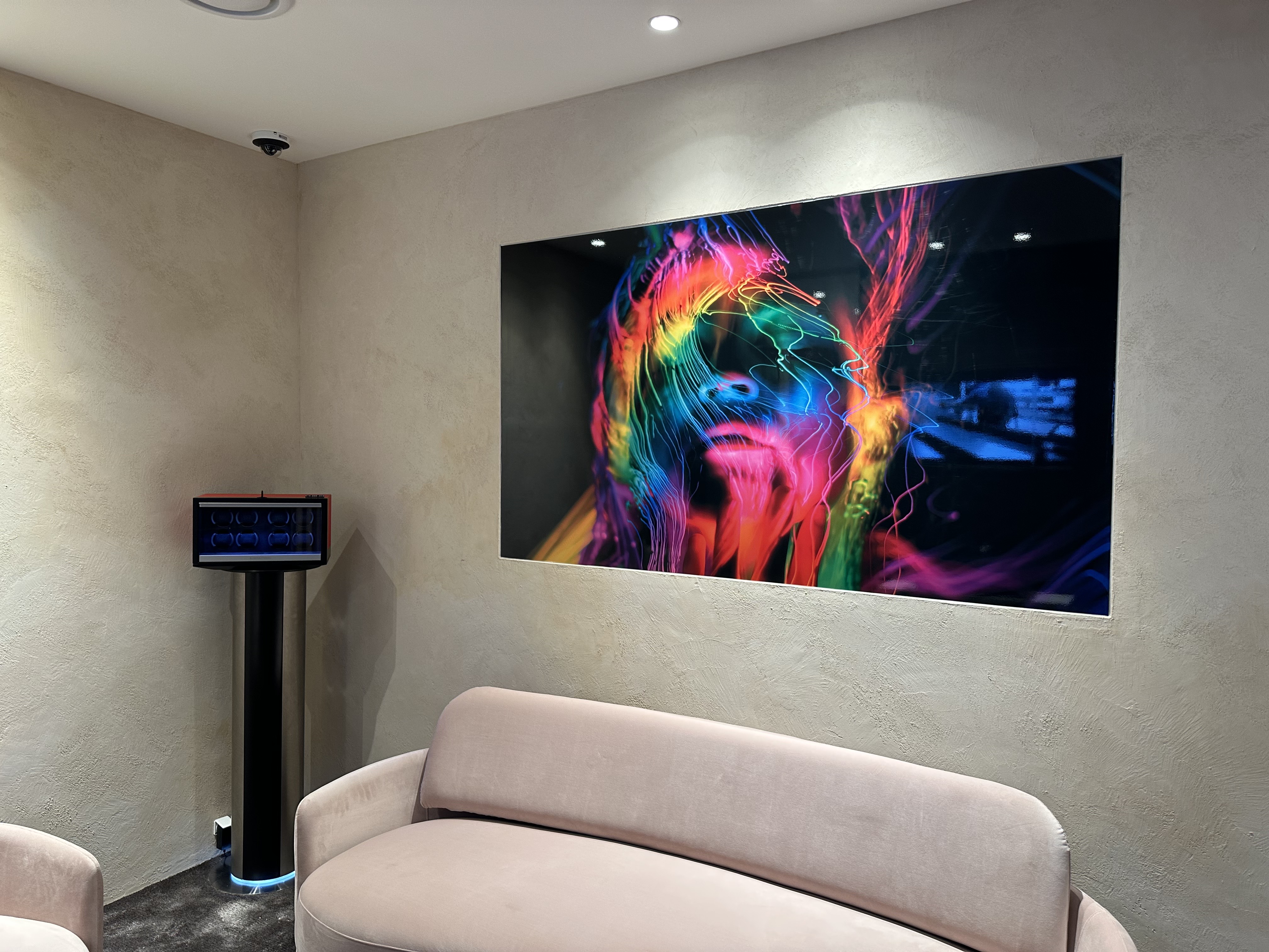 BUBEN&ZORWEG boutique seating area with digital artwork — BUBEN&ZORWEG
