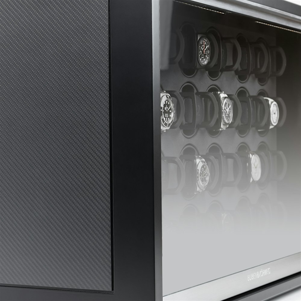 Neo 24 close-up side exposed case interior and watches — BUBEN&ZORWEG