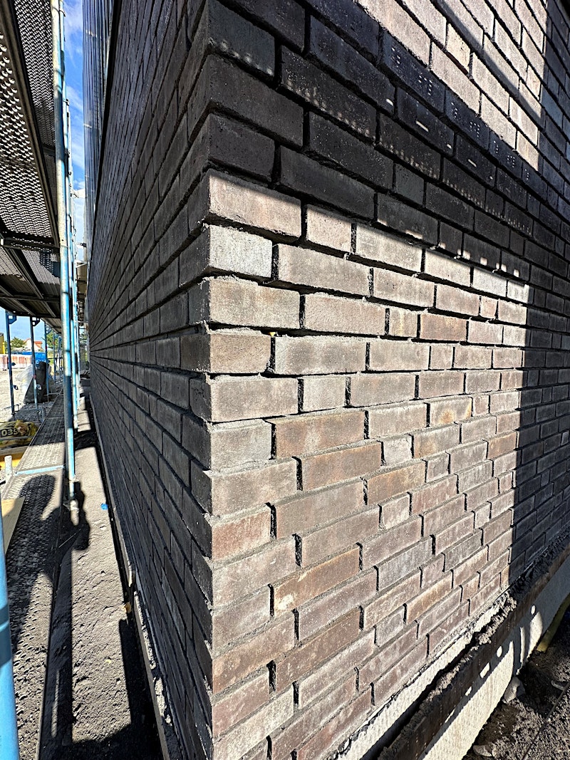 Newly completed brick façade — BUBEN&ZORWEG