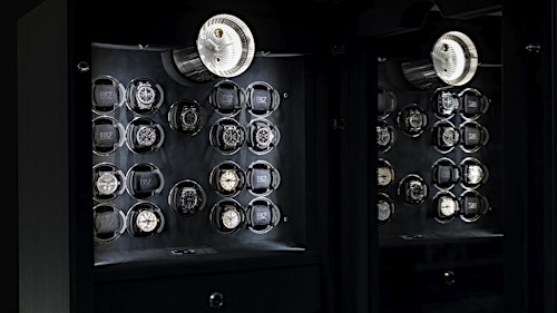 Close-up of the BUBEN&ZORWEG VISION high-security safe interior, featuring multiple watch winders and the Signature Clock. — BUBEN&ZORWEG