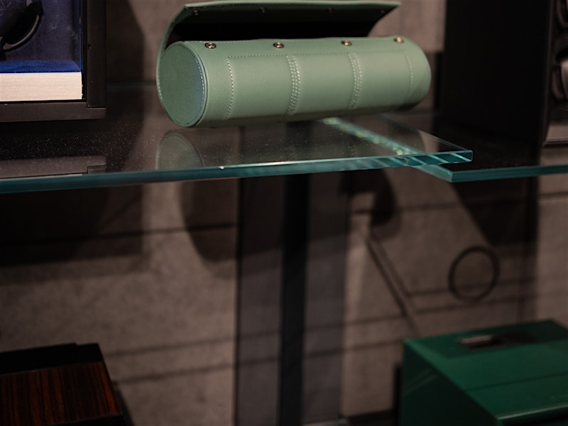 Green leather watch roll on glass shelf — BUBEN&ZORWEG