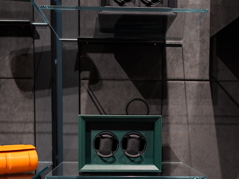 Watch winders displayed on glass shelves — BUBEN&ZORWEG