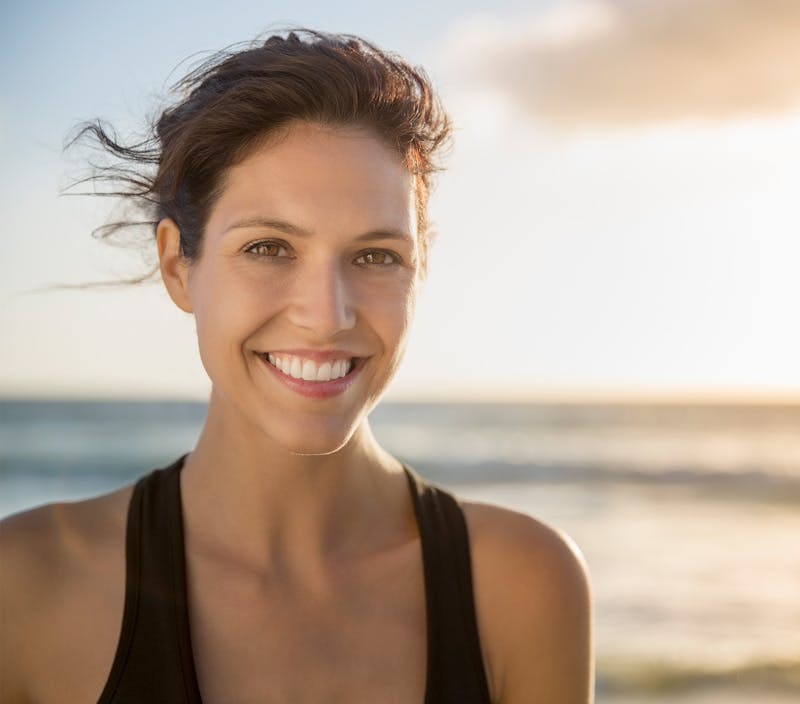 Woman smiling outside