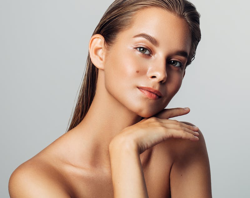 Woman resting her face on her hand