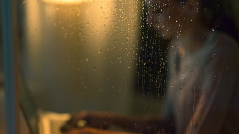 woman on laptop during a storm with backup batteries