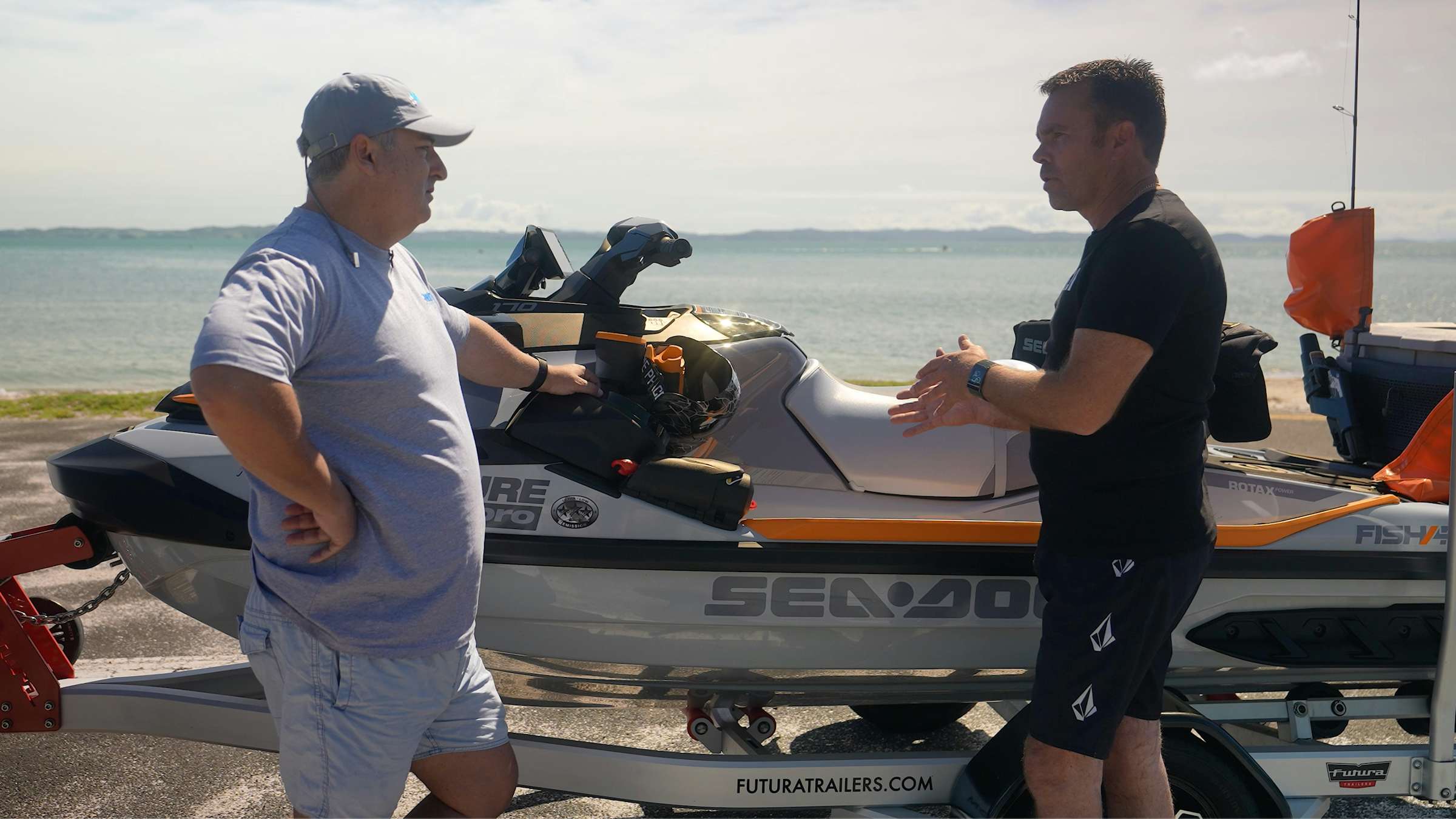 Andrew Hill shows Aaron Mortimer the Sea-Doo Fish Pro Trophy jet ski