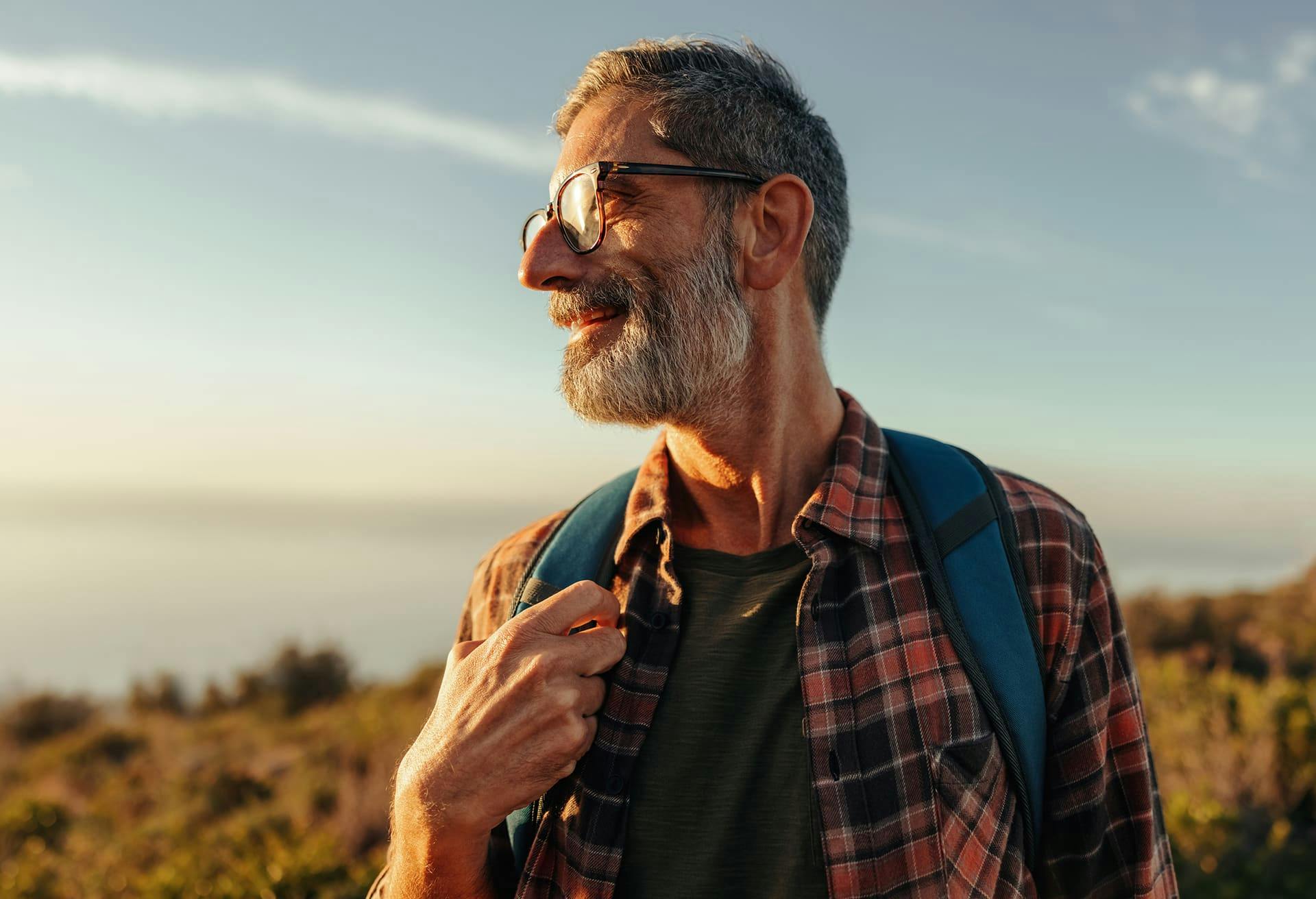 Older Man Standing on a Field