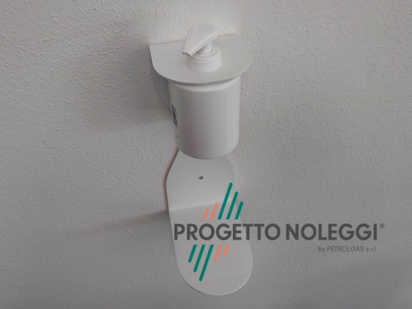 Questo modello di supporto per gel igienizzante mani si applica a muro, in esso si inserisce il flacone dosatore del gel igienizzante per le mani. Il foto per il flacone è di diametro standar per dosatori a pompetta da 0,25 - 0,5 e 1 litro. Prodotta su nostre specifiche in Italia.
