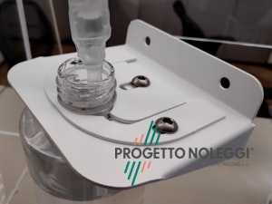 Supporto per dispenser manuale su piastra dispenser automatico Supporto per dispenser manuale su piastra dispenser automatico