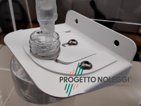 Supporto per dispenser manuale su piastra dispenser automatico Supporto per dispenser manuale su piastra dispenser automatico