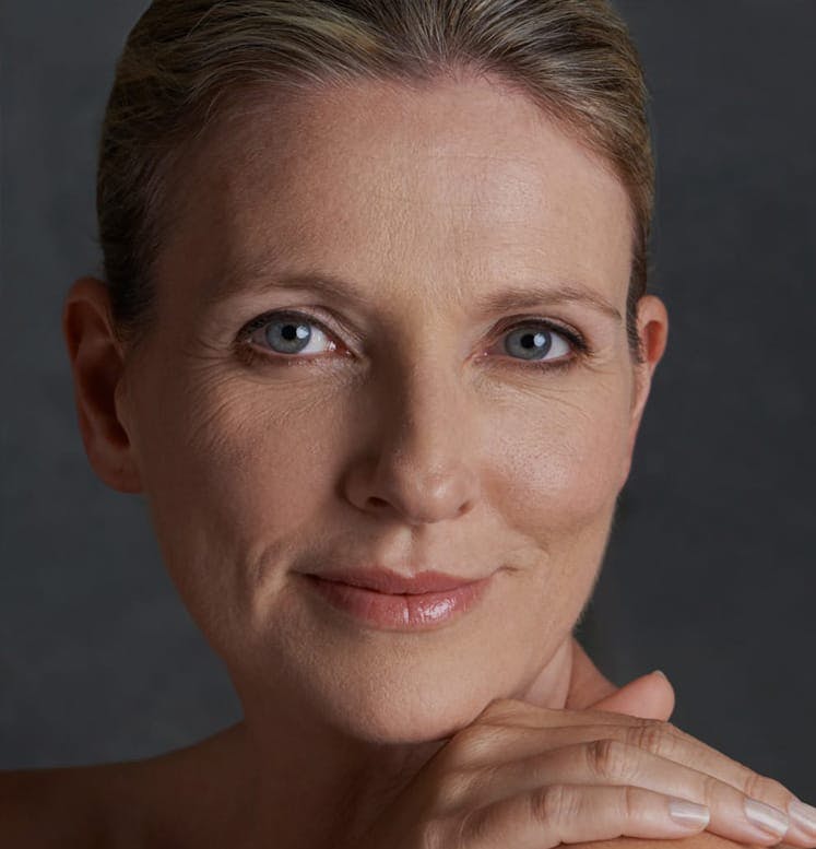 Pretty middle aged woman with blue eyes