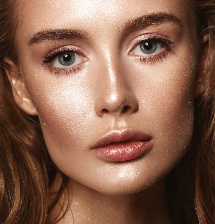 Pretty woman with glowing skin