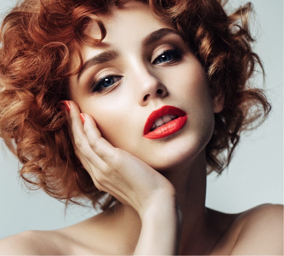 woman with curly red hair
