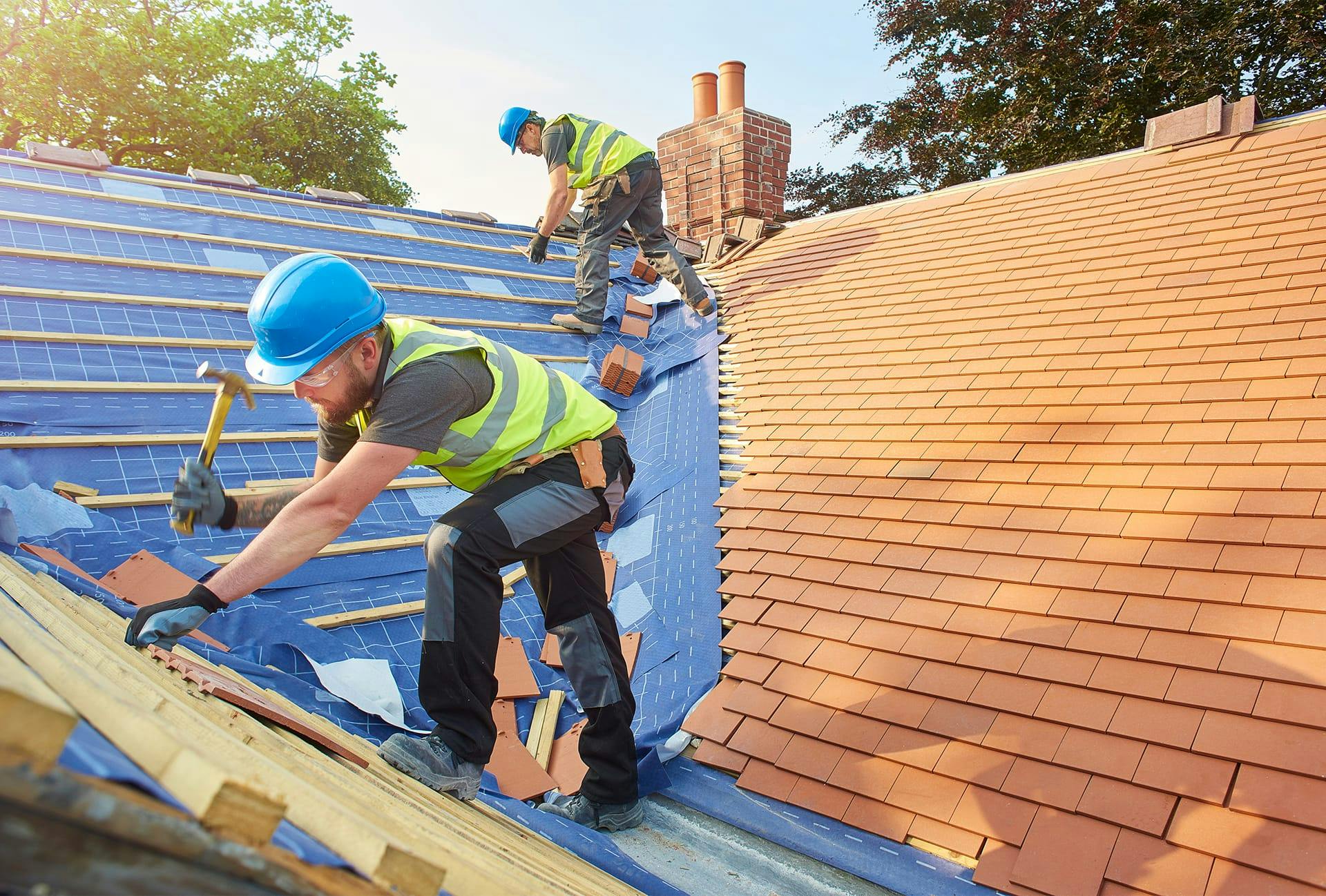 roofing workers on a roof