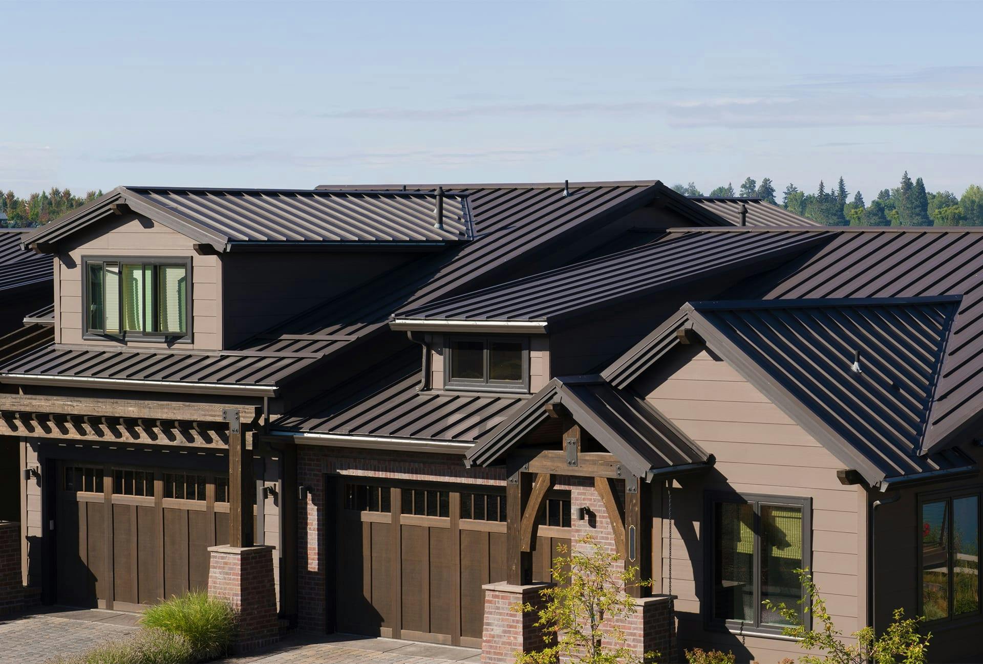 house with a brown roof and a brown garage