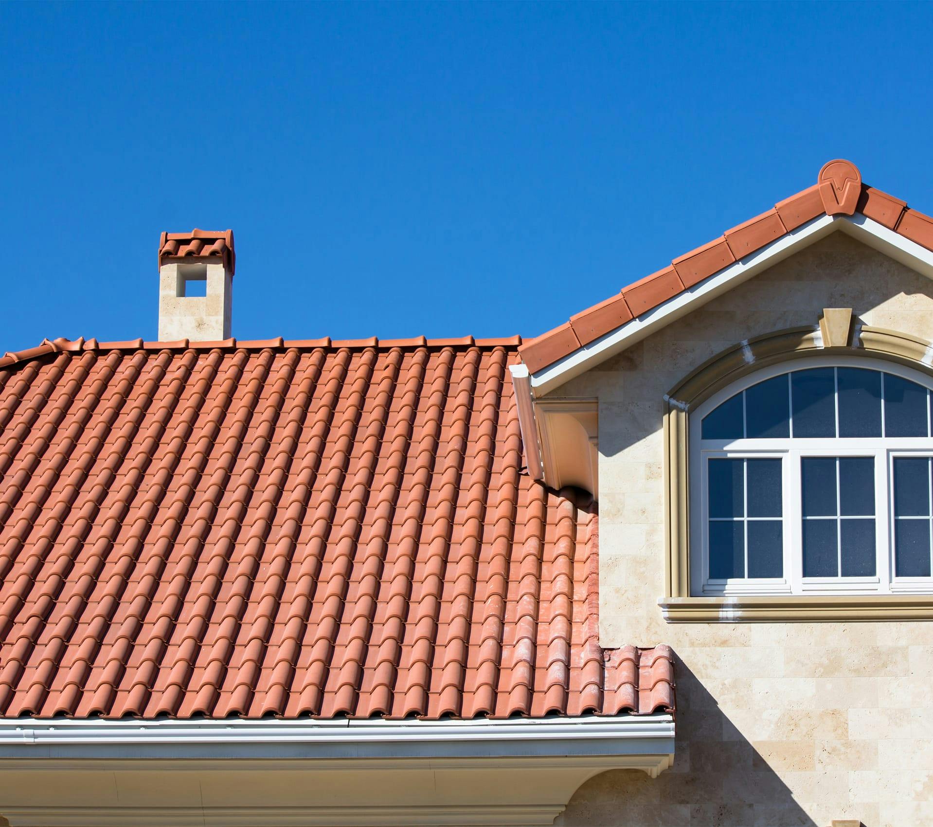 roof with a red tile on a house