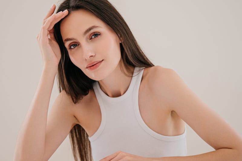 Woman leaning her head on her hand