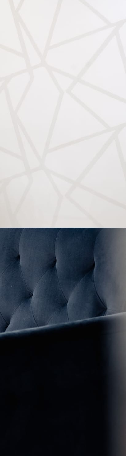 A couch with patterned bacground