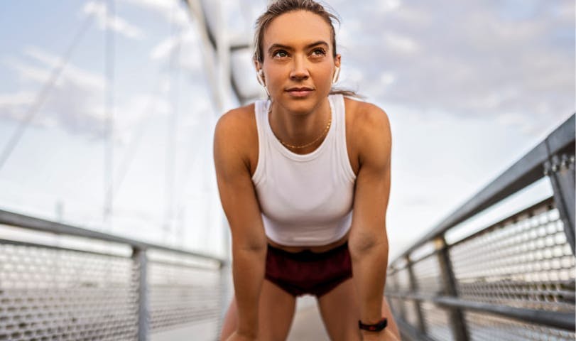 A woman stretching before a workout