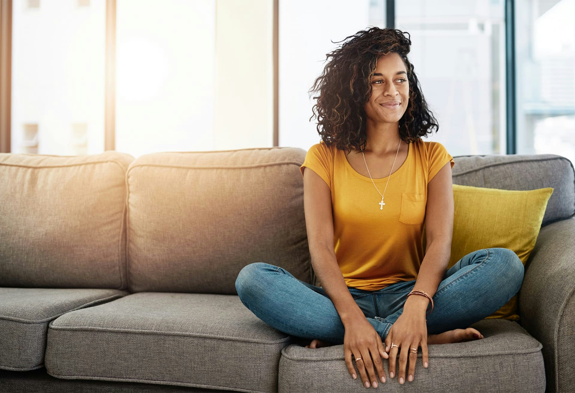 Woman sitting on couch