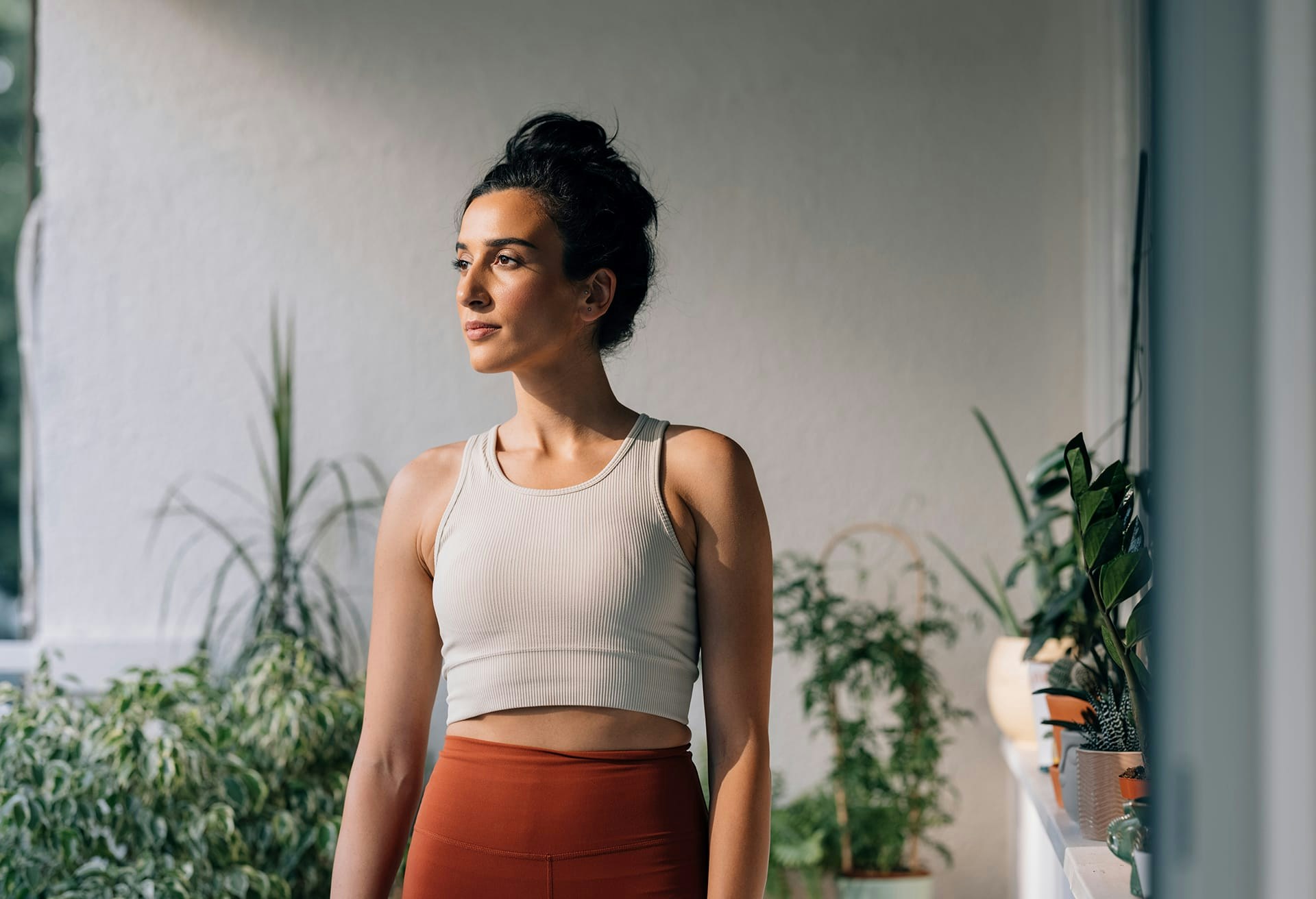 Woman with an updo looking to the side